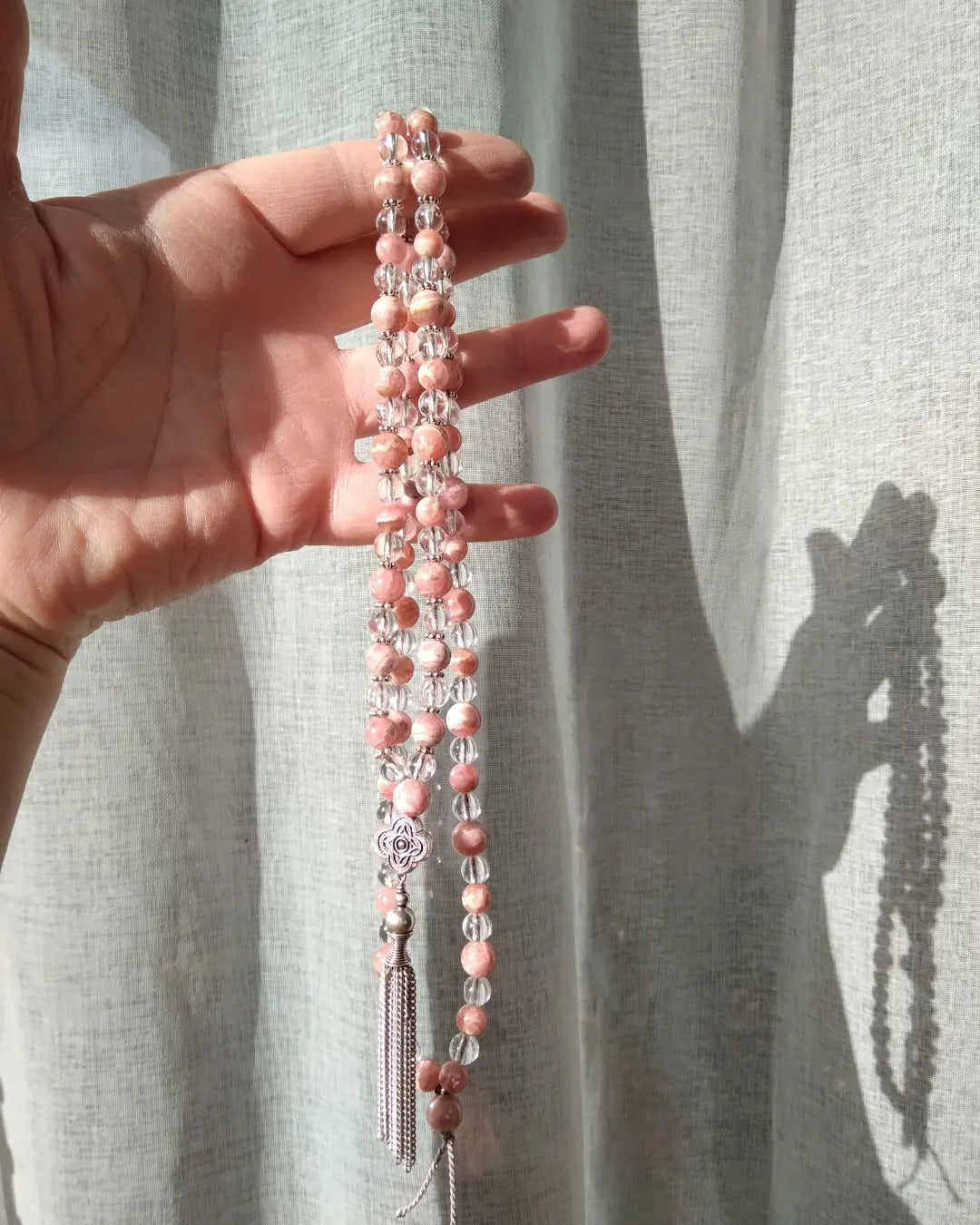 Mala en rhodochrosite et cristal de roche "Expérimente l'amour"